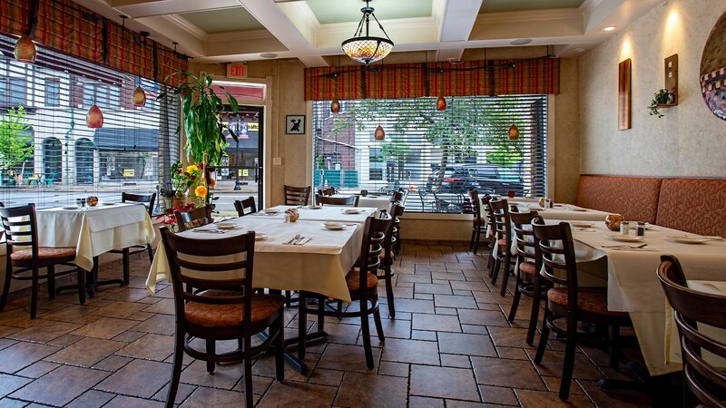 Dining room with many set tables